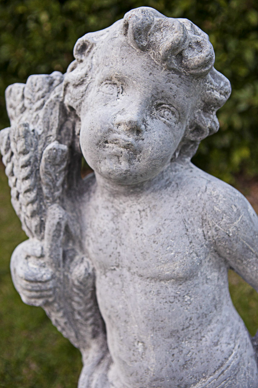 Fall Cherub Statue